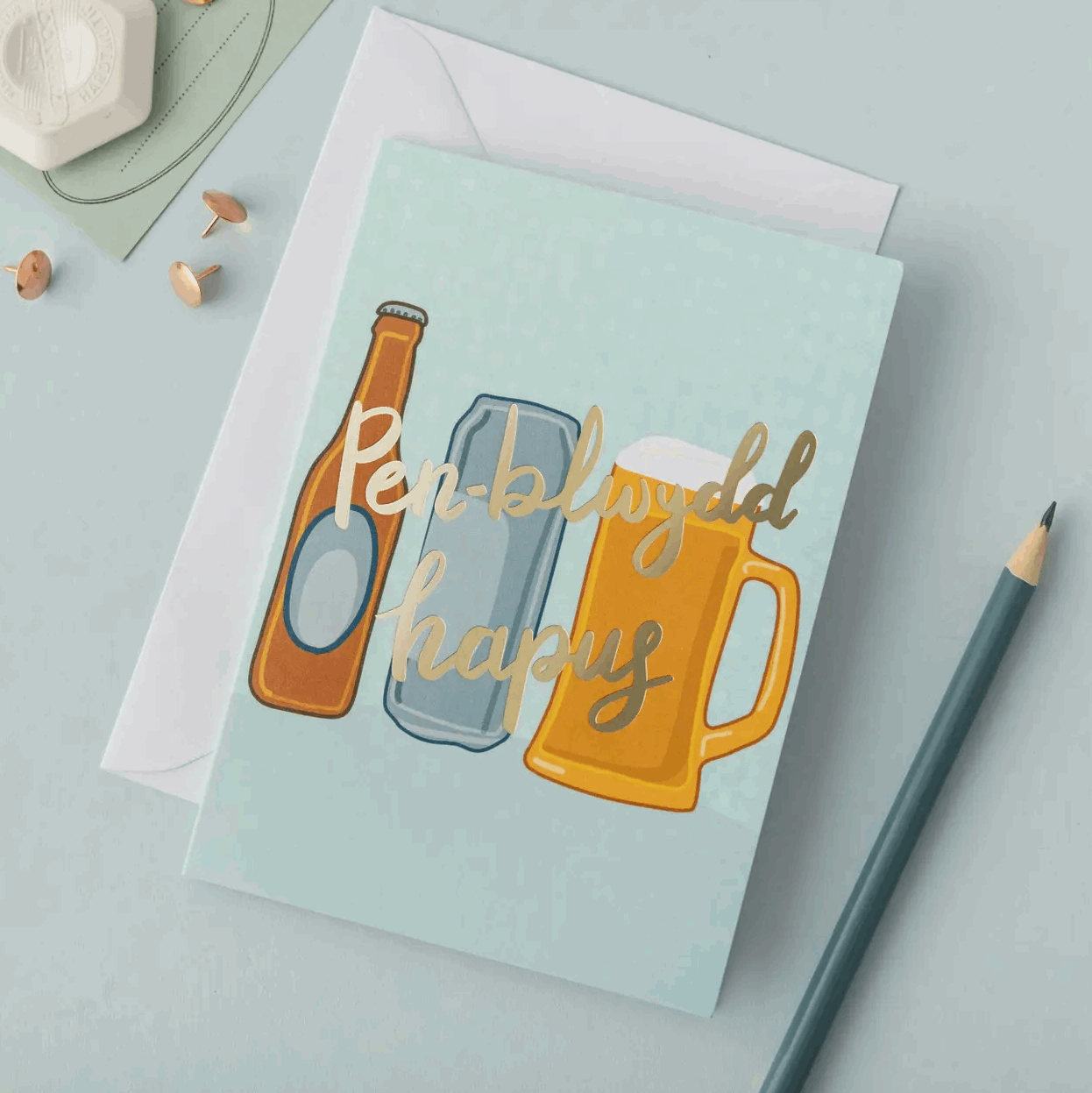 Welsh birthday Greeting card with beer-themed design on a light blue background