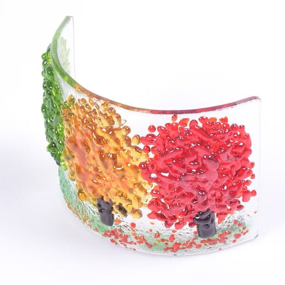 Autumn trees curved glass Side view