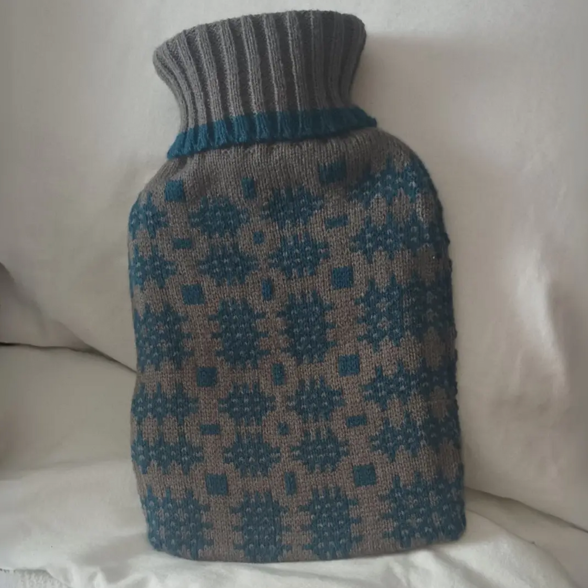 Grey and teal hot water bottle cover in Welsh tapestry design 