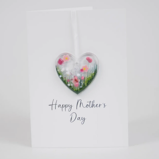 Mothers day card with pink flower heart decoration