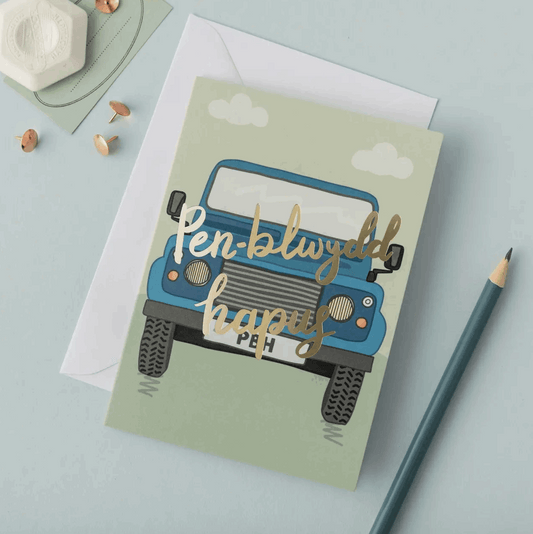 Penblwydd hapus card with blue landrover