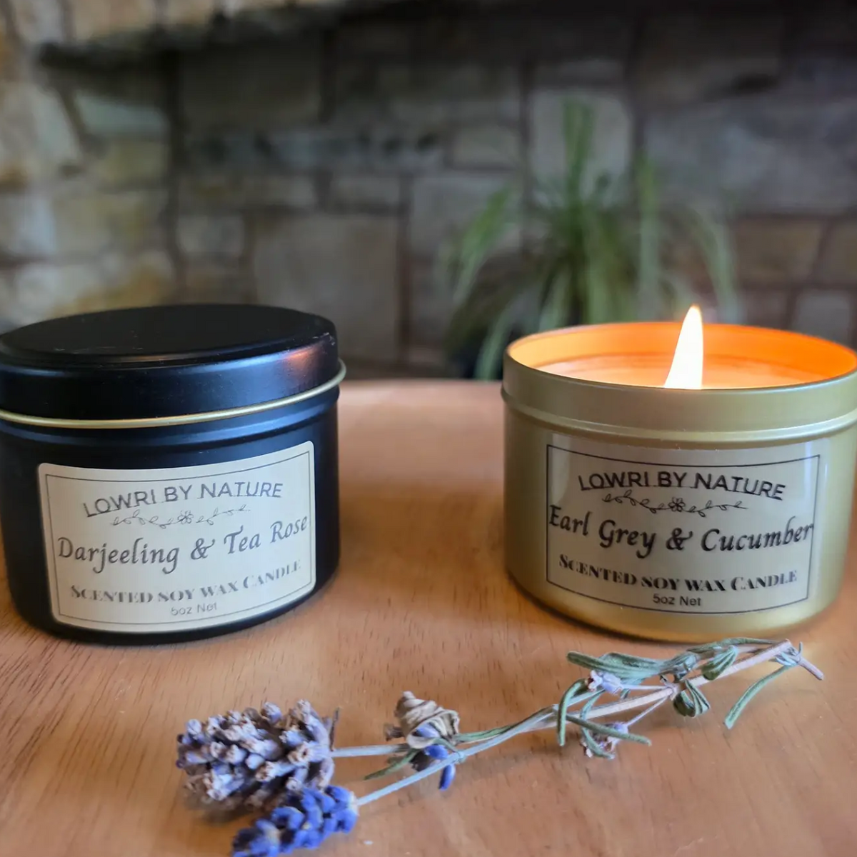 Two tin candles with tea fragrances