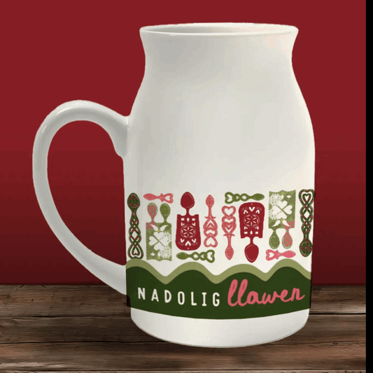Welsh lovespoon Christmas jug